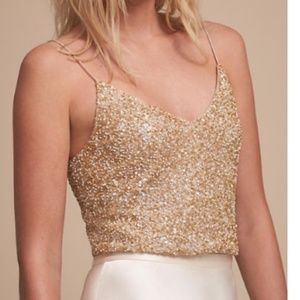 Allegra gold sequins crop top.